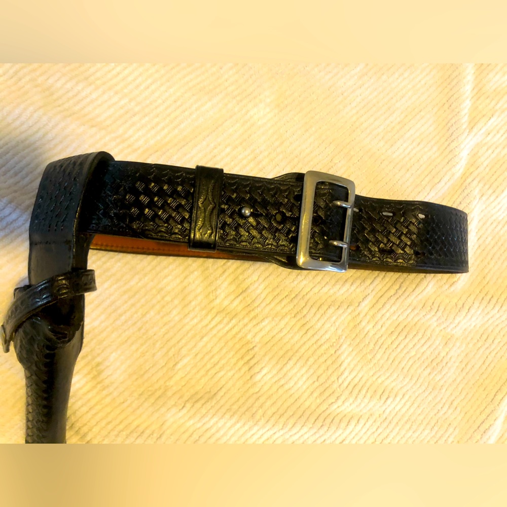 Sam Browns duty belt with holster pictured. Police gear Monterey Brand